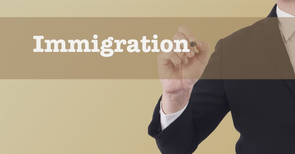 lawyer writing immigration