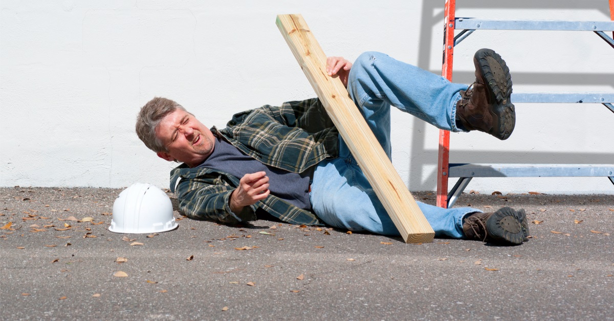 worker falling from stairs with wood log