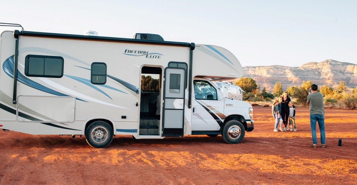 family enjoying near rv