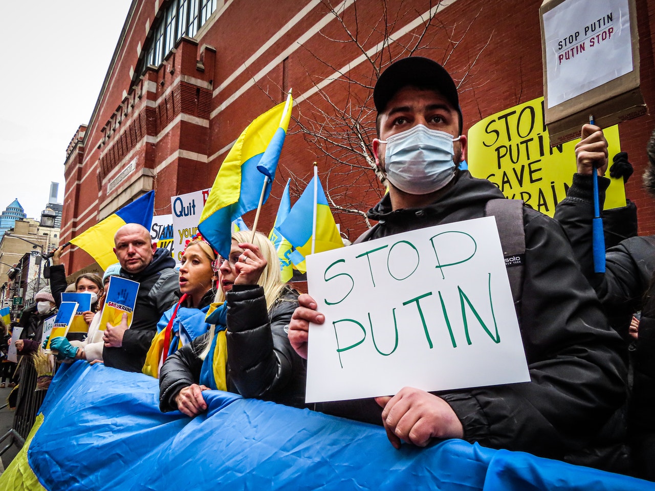 people taking part in street protests against war in ukraine